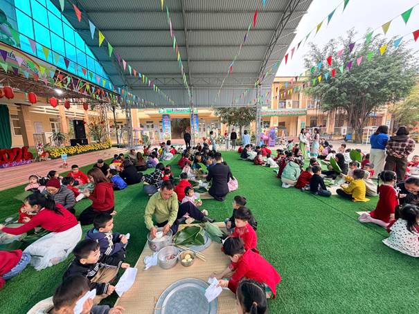 Description: D:\Năm học 2025-2026\ẢNH CÁC HĐ CỦA TRƯỜNG\GÓI BÁNH CHƯNG\gen-o-z7499387200021_59e2e4a021bd5bf7c24dc43e3ca82a99.jpg